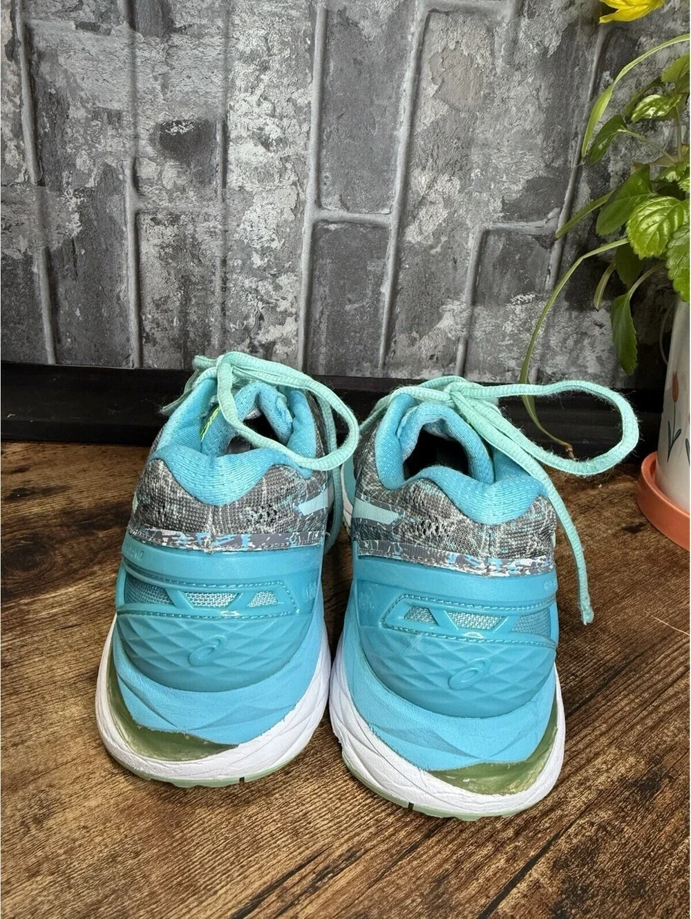 ASICS Gel-Kayano running shoes in a gray/blue/turquoise colorway, Women’s US 7.5